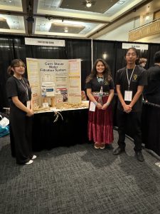 The team from Tohatchi High School presents their project on water filtration at the 2024 New Mexico Governor's STEM Challenge at UNM.