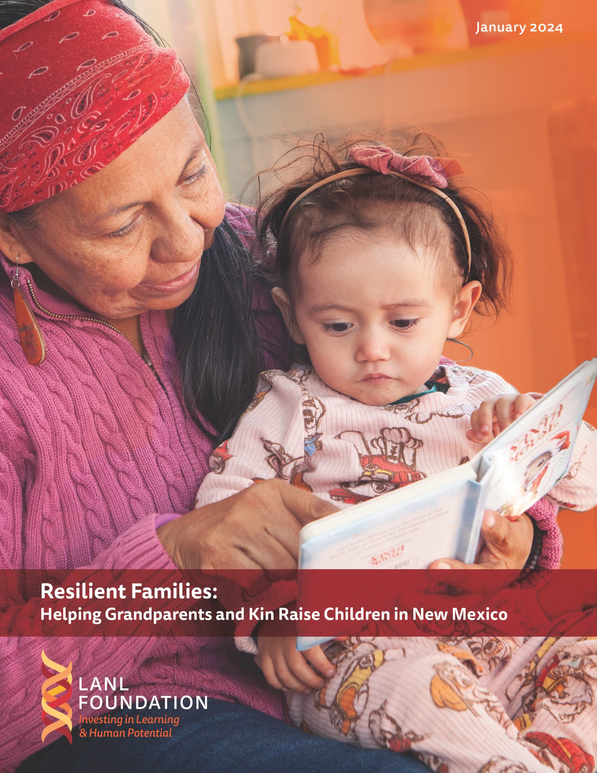 Image of grandmother reading to young child.